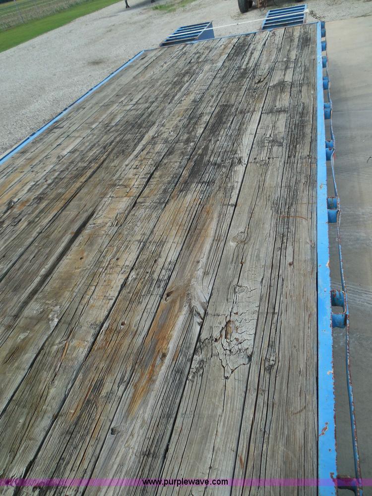 image for item I3387 1999 CFS Welding Services gooseneck flatbed trailer