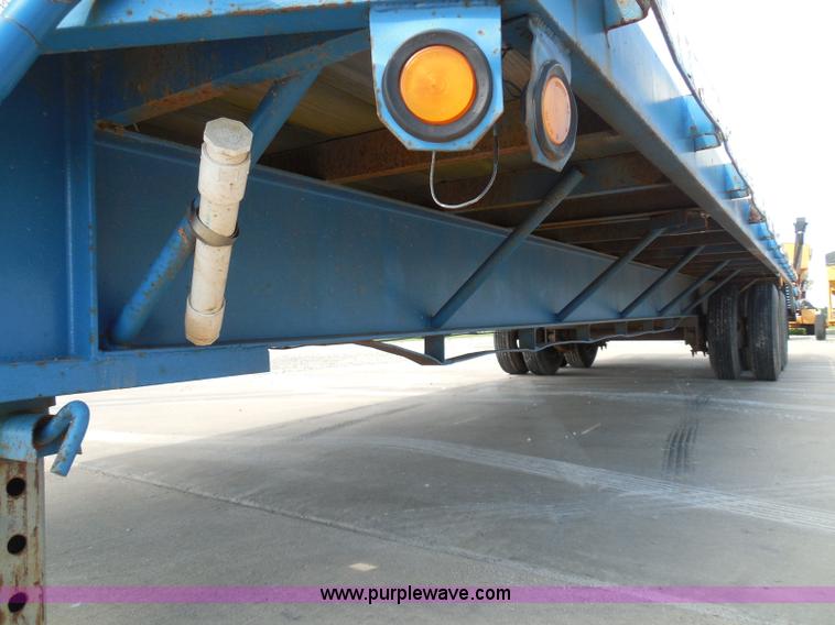image for item I3387 1999 CFS Welding Services gooseneck flatbed trailer