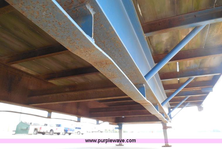 image for item I3387 1999 CFS Welding Services gooseneck flatbed trailer