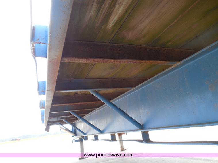 image for item I3387 1999 CFS Welding Services gooseneck flatbed trailer