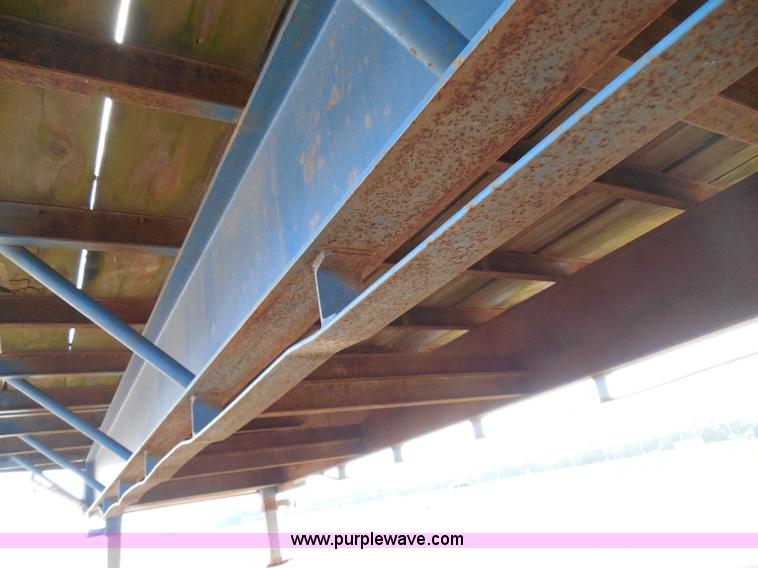 image for item I3387 1999 CFS Welding Services gooseneck flatbed trailer