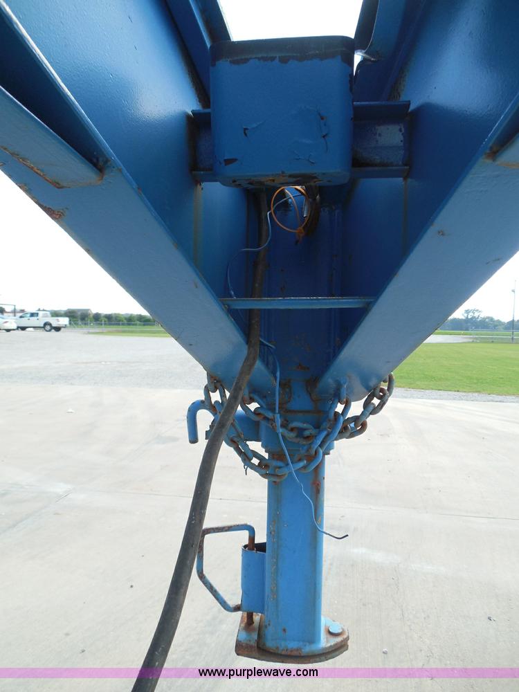 image for item I3387 1999 CFS Welding Services gooseneck flatbed trailer