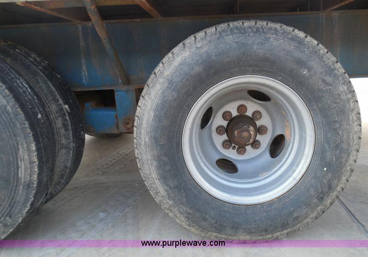 image for item I3387 1999 CFS Welding Services gooseneck flatbed trailer