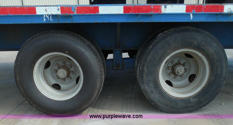 image for item I3387 1999 CFS Welding Services gooseneck flatbed trailer