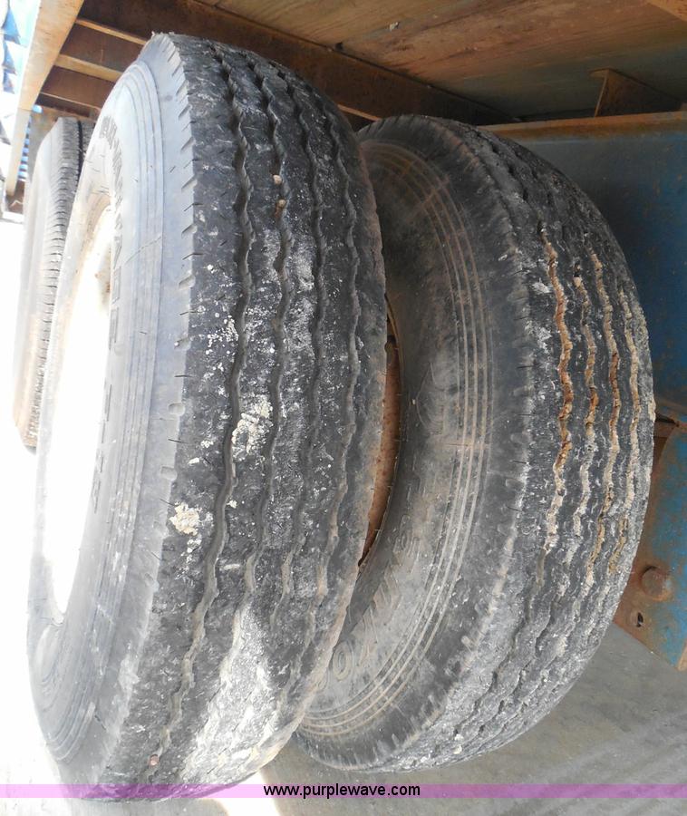 image for item I3387 1999 CFS Welding Services gooseneck flatbed trailer