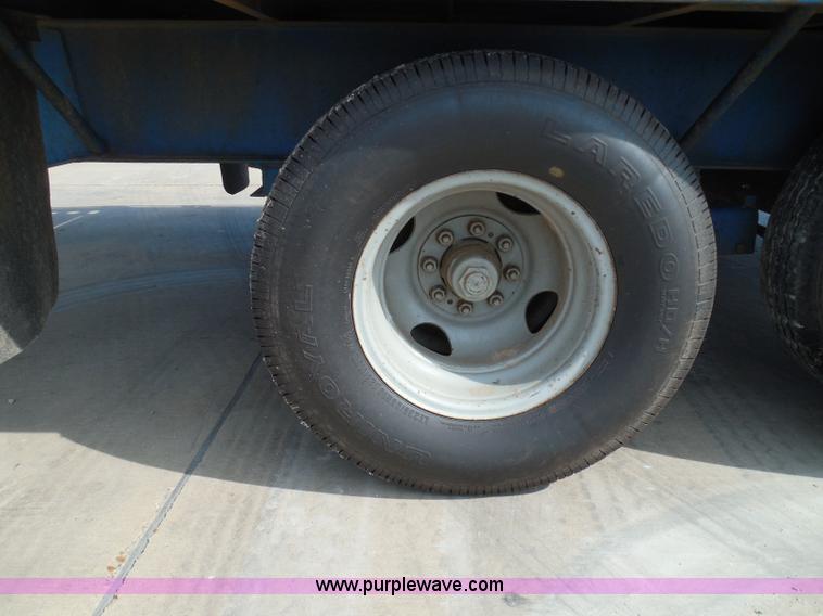 image for item I3387 1999 CFS Welding Services gooseneck flatbed trailer