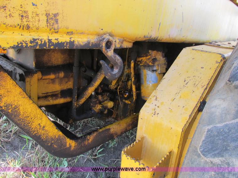 image for item AW9899 John Deere 770A articulated motor grader