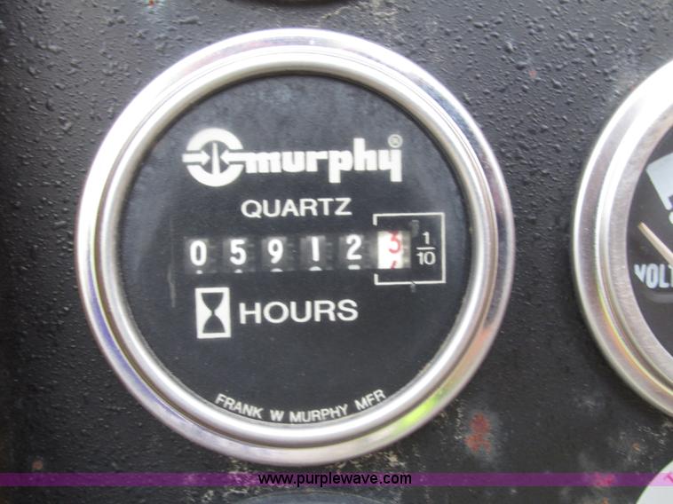 image for item G9993 1988 Lincoln 660H windrow elevator