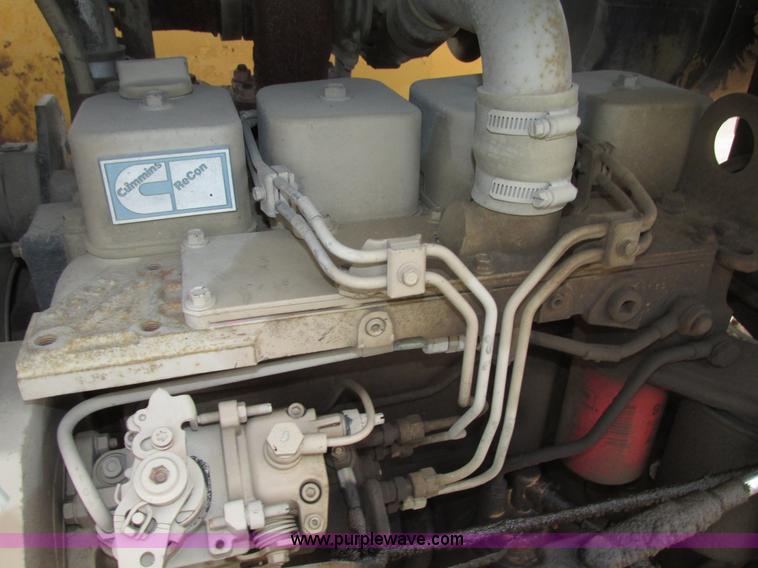 image for item G9993 1988 Lincoln 660H windrow elevator