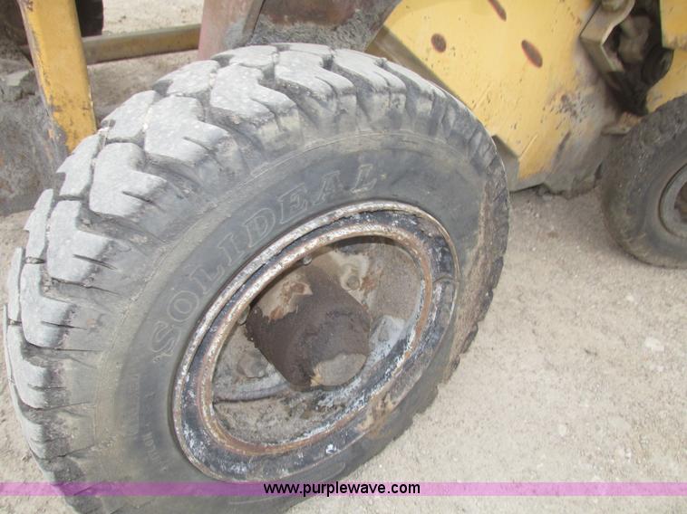 image for item G9993 1988 Lincoln 660H windrow elevator