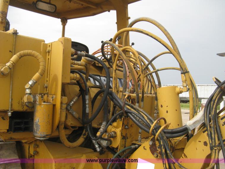 image for item H5255 1991 Caterpillar D5H Series II dozer with vibratory cable plow