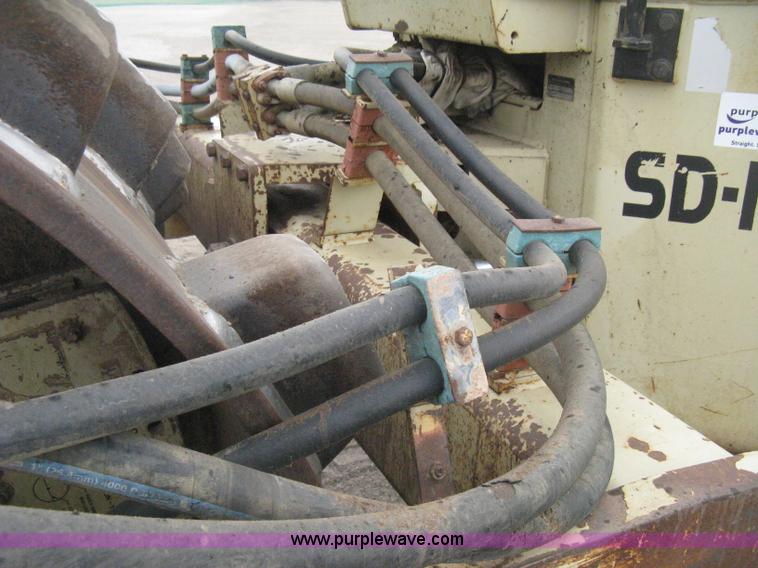 image for item H5256 1990 Ingersoll Rand SD-100F articulated vibratory pad foot roller