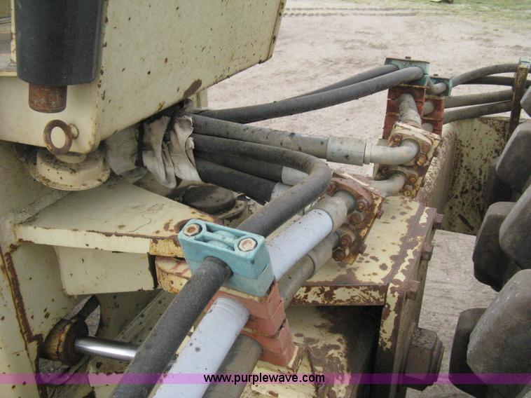 image for item H5256 1990 Ingersoll Rand SD-100F articulated vibratory pad foot roller