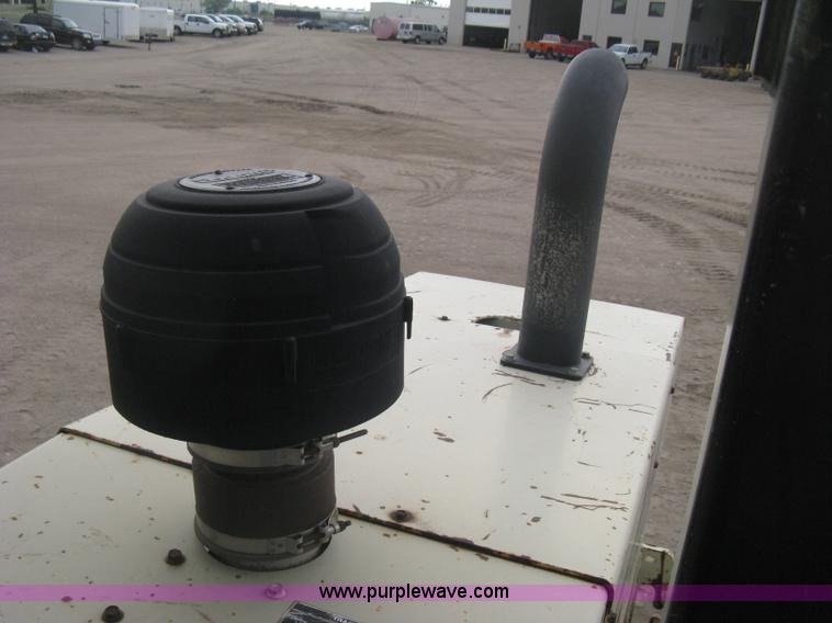 image for item H5256 1990 Ingersoll Rand SD-100F articulated vibratory pad foot roller