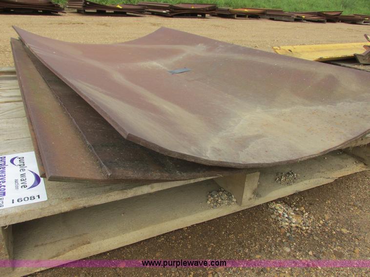 image for item I6081 (4) units of rolled iron dozer facing