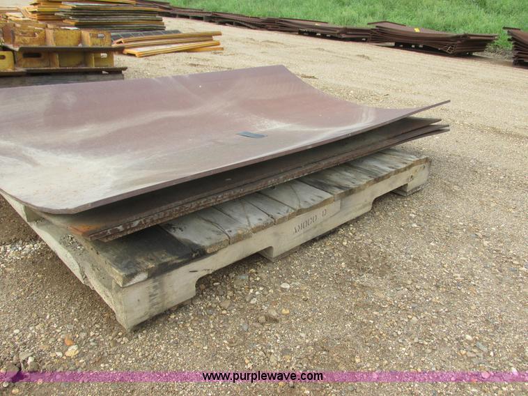 image for item I6081 (4) units of rolled iron dozer facing