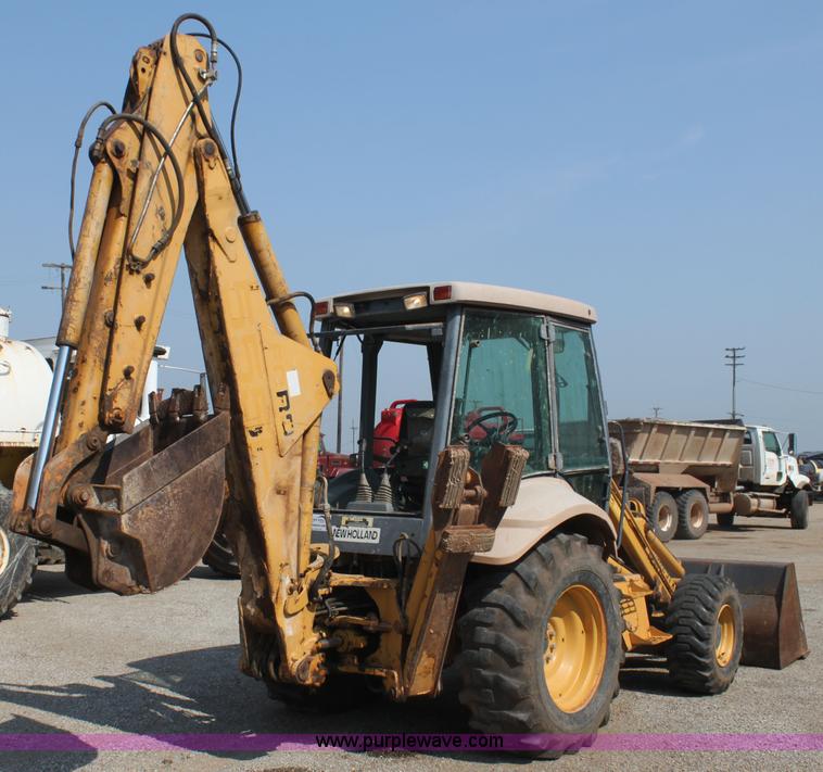 image for item I7262 New Holland 555E backhoe