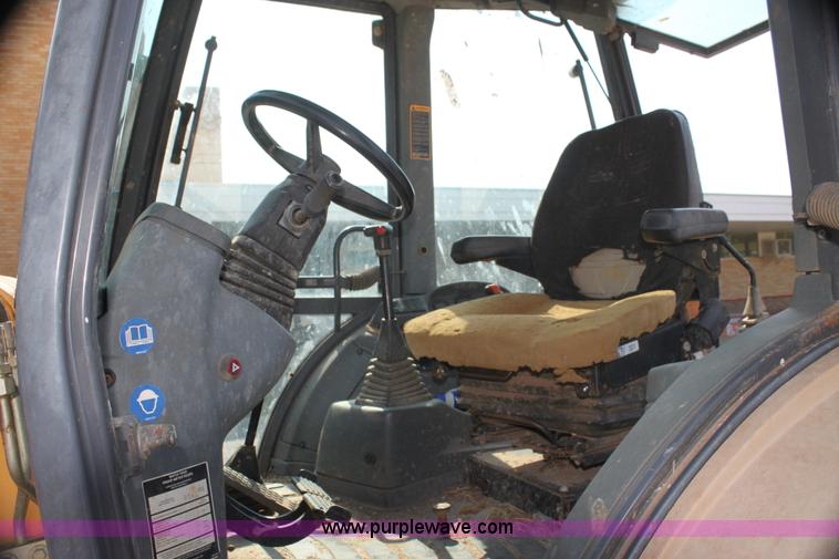 image for item I7262 New Holland 555E backhoe