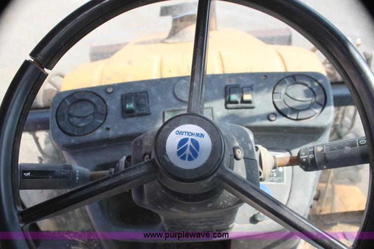 image for item I7262 New Holland 555E backhoe