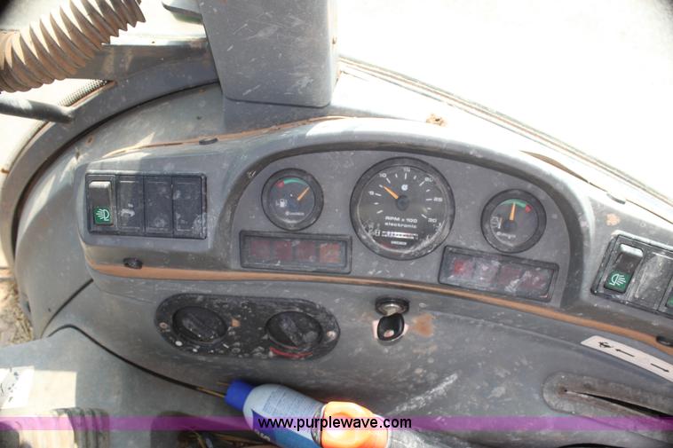 image for item I7262 New Holland 555E backhoe