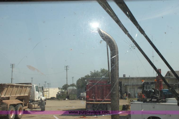 image for item I7262 New Holland 555E backhoe