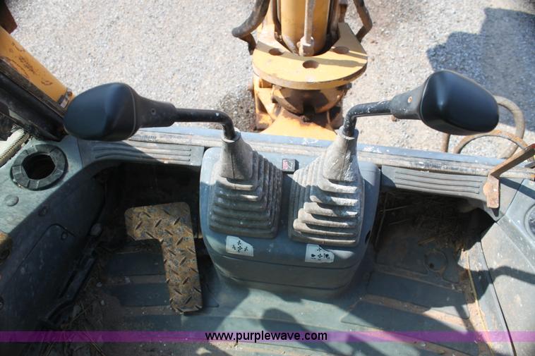 image for item I7262 New Holland 555E backhoe