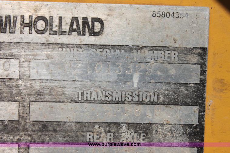 image for item I7262 New Holland 555E backhoe