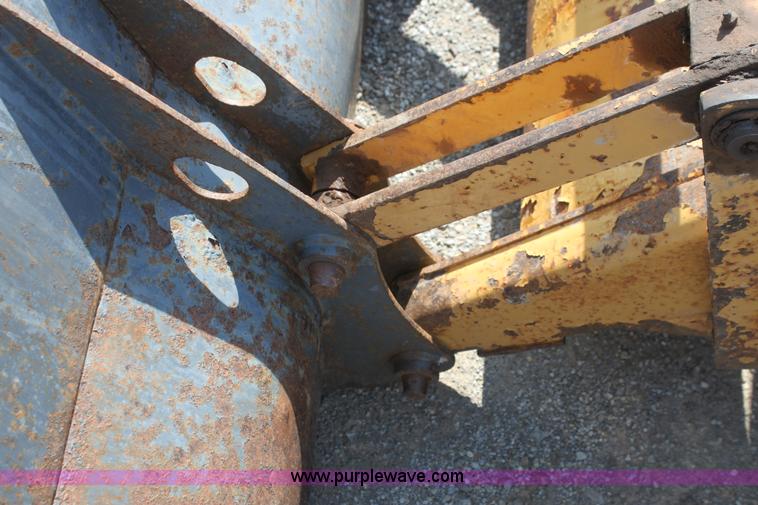 image for item I7262 New Holland 555E backhoe