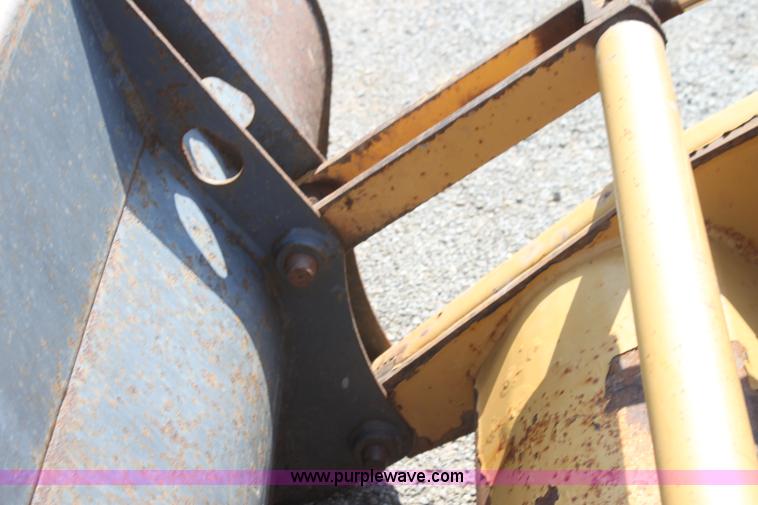 image for item I7262 New Holland 555E backhoe