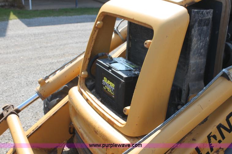 image for item I7262 New Holland 555E backhoe