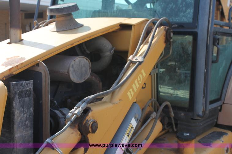 image for item I7262 New Holland 555E backhoe
