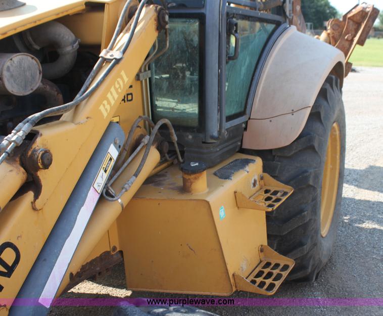 image for item I7262 New Holland 555E backhoe