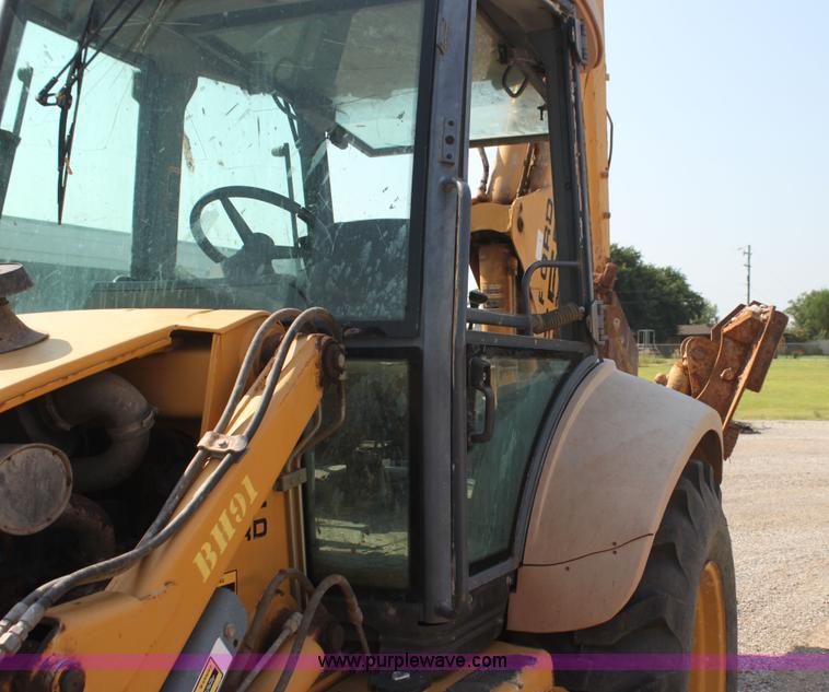 image for item I7262 New Holland 555E backhoe