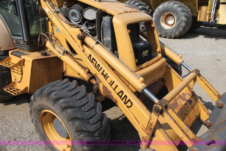 image for item I7262 New Holland 555E backhoe