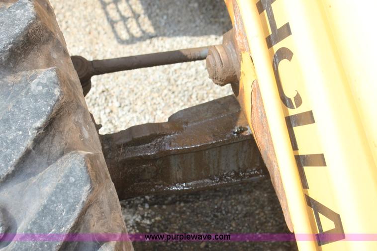 image for item I7262 New Holland 555E backhoe