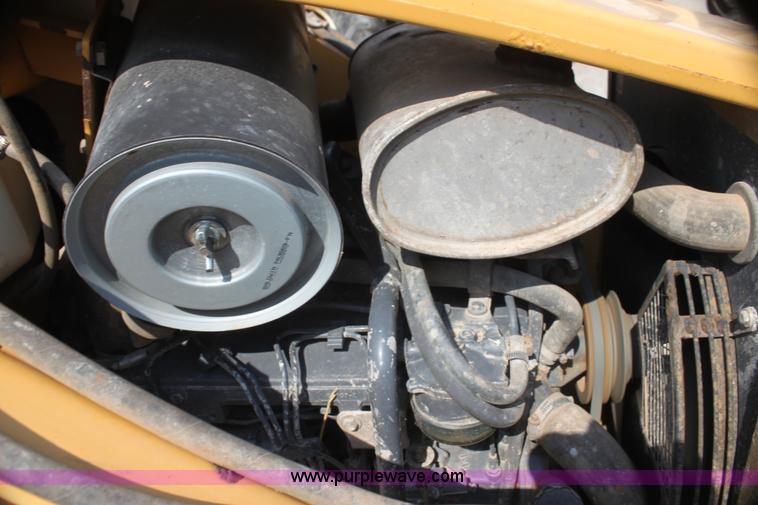 image for item I7262 New Holland 555E backhoe