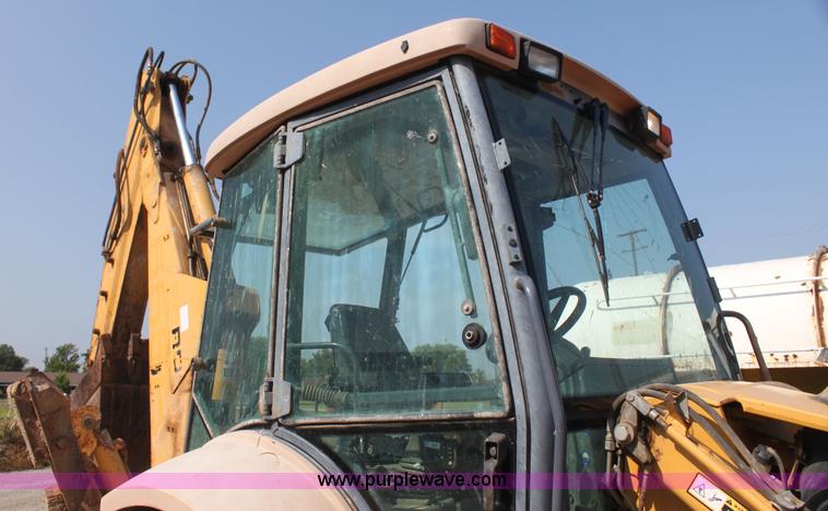 image for item I7262 New Holland 555E backhoe