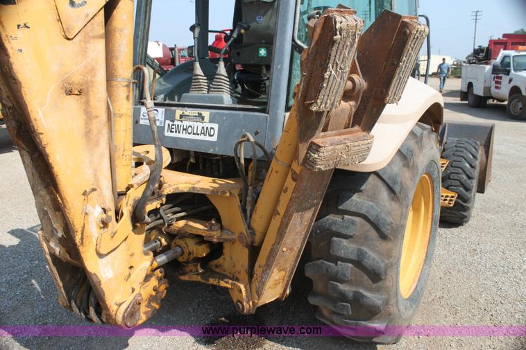 image for item I7262 New Holland 555E backhoe