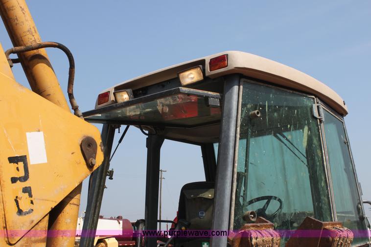 image for item I7262 New Holland 555E backhoe