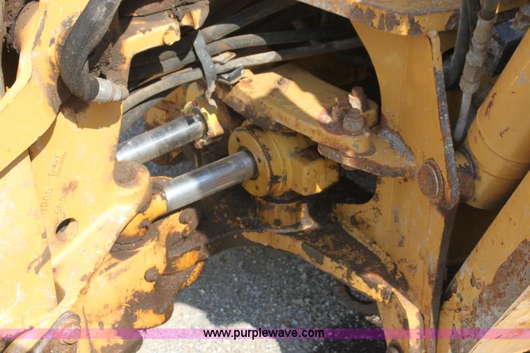 image for item I7262 New Holland 555E backhoe