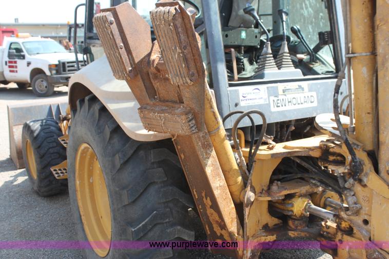 image for item I7262 New Holland 555E backhoe