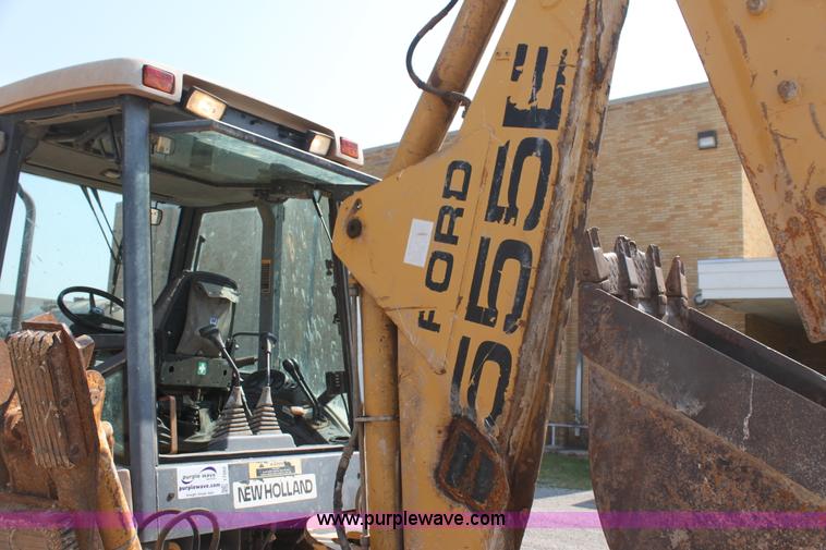 image for item I7262 New Holland 555E backhoe