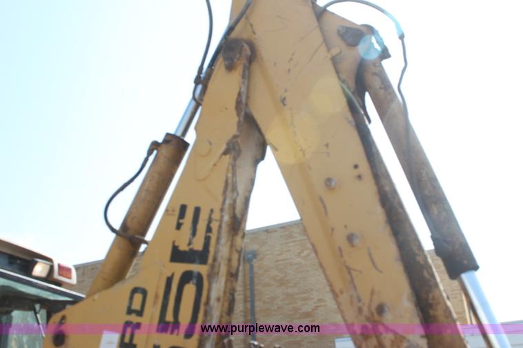 image for item I7262 New Holland 555E backhoe