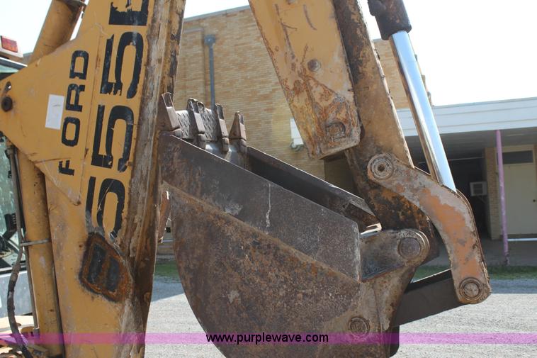 image for item I7262 New Holland 555E backhoe