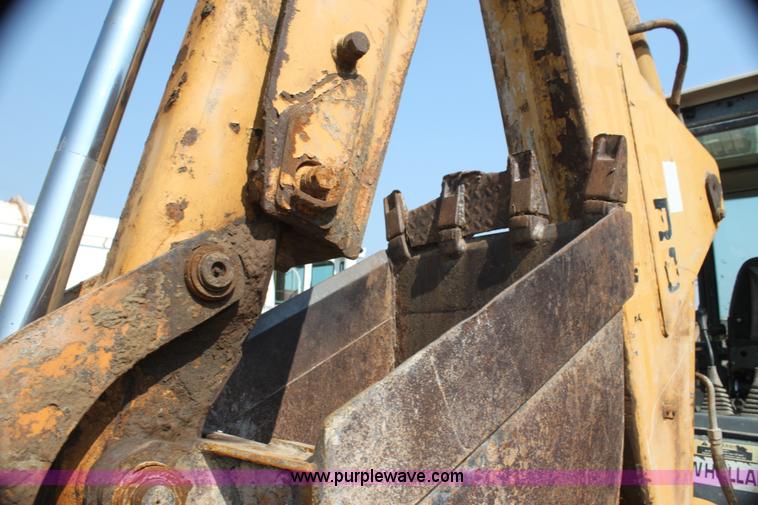 image for item I7262 New Holland 555E backhoe