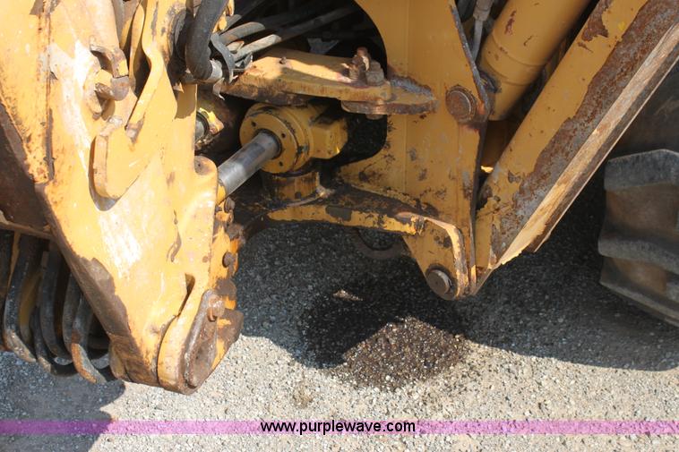 image for item I7262 New Holland 555E backhoe