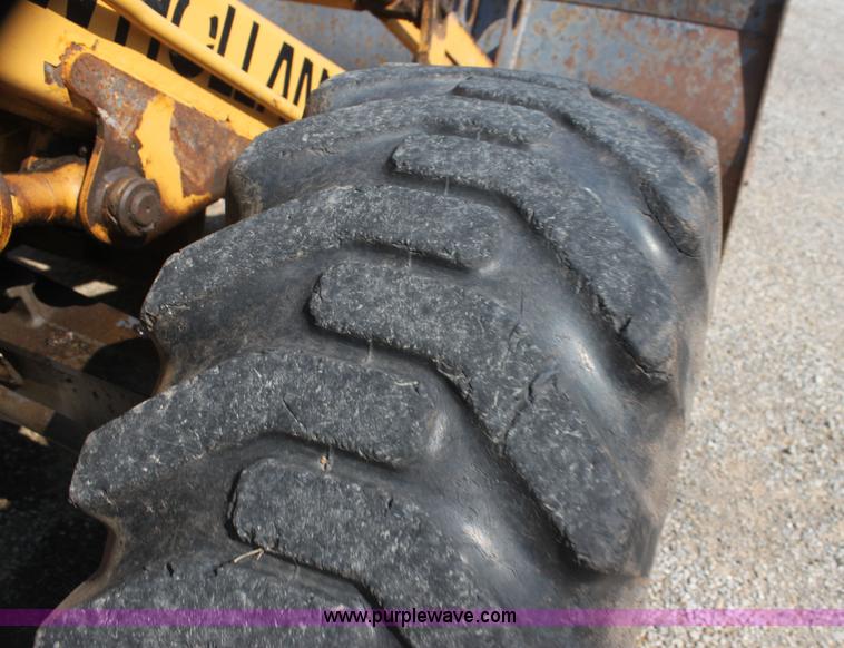 image for item I7262 New Holland 555E backhoe