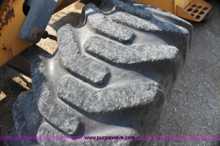 image for item I7262 New Holland 555E backhoe