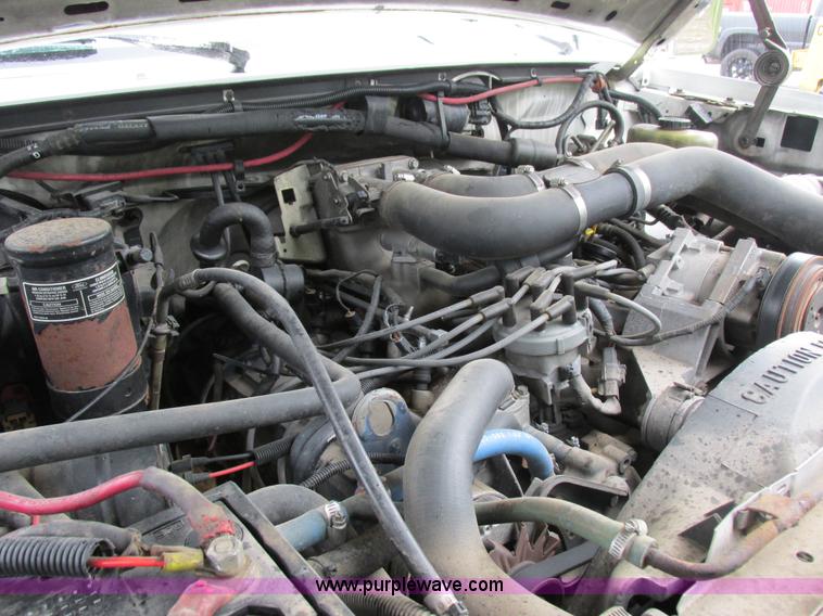 image for item I8949 1993 Ford F450 Super Duty XL flatbed truck