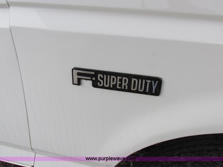 image for item I8949 1993 Ford F450 Super Duty XL flatbed truck